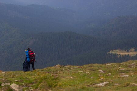 GOVERLA, UKRAINE - SEPTEMBER 20, 2015 : A group of tourists climbs to the highest mountain of Ukraine Hoverla 2061 METER on SEPTEMBER 20, 2015のeditorial素材