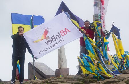 GOVERLA, UKRAINE - SEPTEMBER 20, 2015 : A group of tourists climbs to the highest mountain of Ukraine Hoverla 2061 METER on SEPTEMBER 20, 2015のeditorial素材