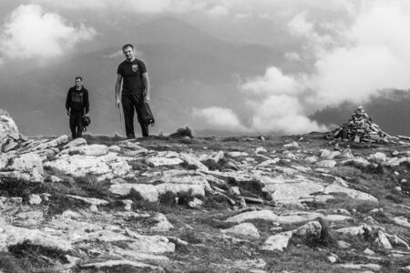 GOVERLA, UKRAINE - SEPTEMBER 20, 2015 : A group of tourists climbs to the highest mountain of Ukraine Hoverla 2061 METER on SEPTEMBER 20, 2015のeditorial素材