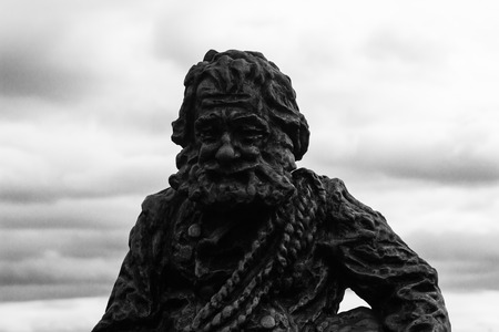 LVIV, UKRAINE - NOVEMBER 15, 2015: Sculpture a chimney sweep on the roof of the House of Legends on November 15, 2015 in Lviv, Ukraine. Lvov is recognized as the most attractive city for tourists in Ukraineのeditorial素材