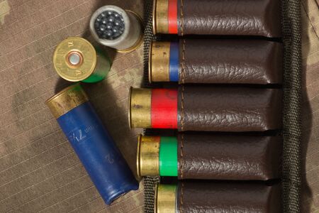 The Bandoleer bag, hunting ammunition. Camouflage backgroundの写真素材
