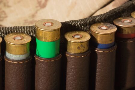 The Bandoleer bag, hunting ammunition. Camouflage background