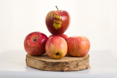 Apple - heart on white background. I love youの写真素材