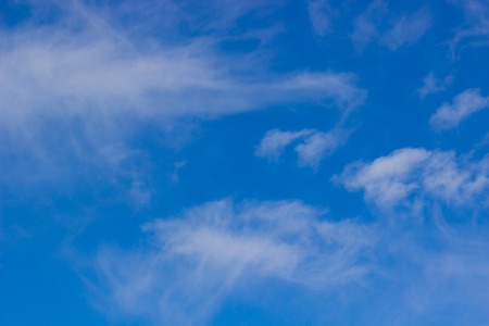 Fantastic soft white clouds against blue sky. Backgroundの写真素材