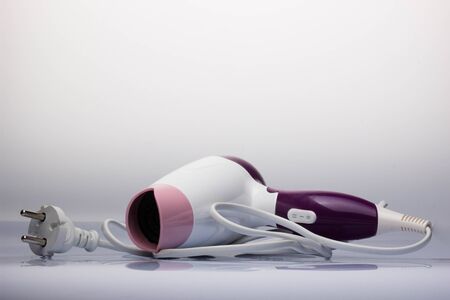 Hair dryer over white backgroundの写真素材