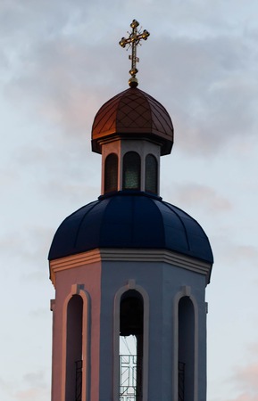 church. Bell tower in the sunset sky