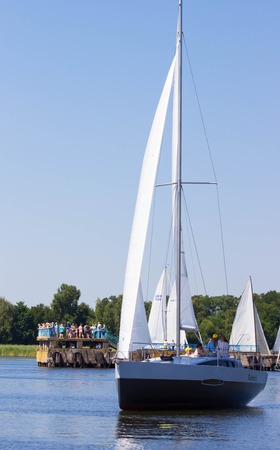 PEREYASLAV, UKRAINE- AUGUST 6, 2016: Boat in sailing regatta. Cup of Pereyaslav 2016のeditorial素材