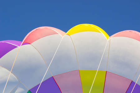the colorful stripes of parachute in the sky. Clouse upの写真素材