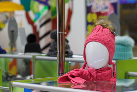 Colorful women's hat in a retail shop. Fashion and shopping concept.の写真素材