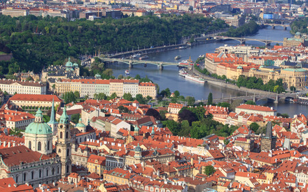 Image of Prague bridges over Vltava river, capital city of Czech Republic, during twilight blue...