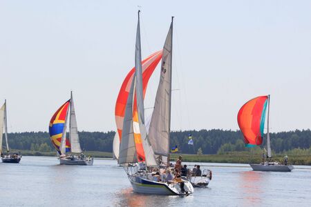 PEREYASLAV, UKRAINE- AUGUST 5, 2017: Boat in sailing regatta Cup of Pereyaslav on a bright sunny dayのeditorial素材