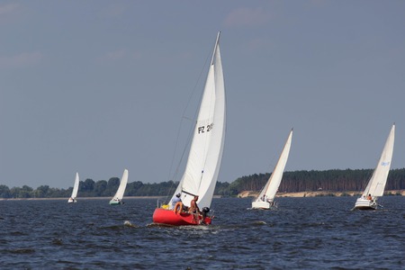 PEREYASLAV, UKRAINE- AUGUST 5, 2017: Boat in sailing regatta Cup of Pereyaslav on a bright sunny dayのeditorial素材