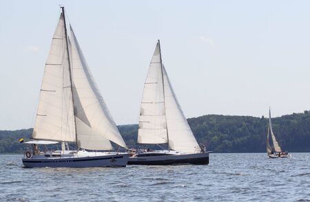 PEREYASLAV, UKRAINE- AUGUST 5, 2017: Boat in sailing regatta Cup of Pereyaslav on a bright sunny dayのeditorial素材