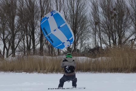 CHERKASSY, UKRAINE - January 29, 2017Snowboarder with kite on free ride. Sheregesh resort, Cherkassy, Ukraineのeditorial素材