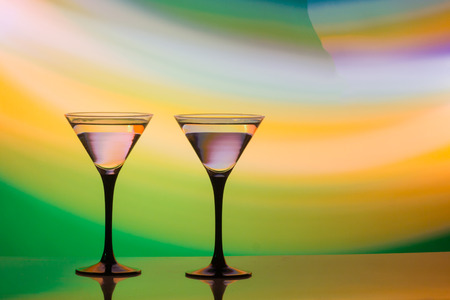 colourful cocktail on the club light background. Party club entertainment. Mixed lightの写真素材