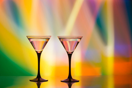 colourful cocktail on the club light background. Party club entertainment. Mixed lightの写真素材