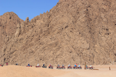 ATV riders in Desert Egyptの写真素材