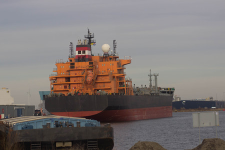 Huge container cargo ship heading for port.