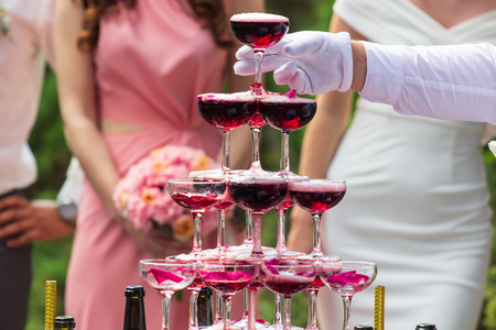 Pyramid of pink champagne. Bright emotions of your holiday. Studio Barの写真素材