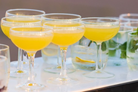 Alcohol coctail drink on the table in restaurant.