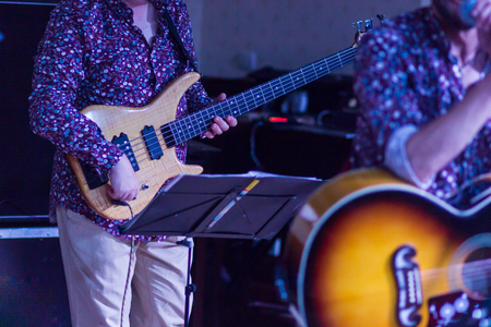 Guitarist on stage for background, soft and blur conceptの写真素材