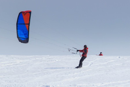 Geroimovka, Ukraine. March 5, 2018 Frosty morning. Man is engaged in winter kiting.のeditorial素材