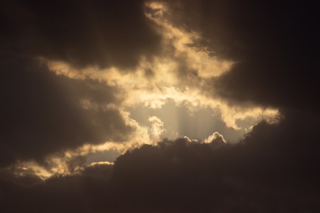 Light in the Dark and Dramatic Storm Clouds.の写真素材