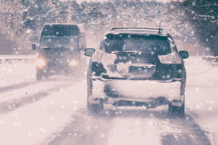 Busy road in winter evening.の写真素材