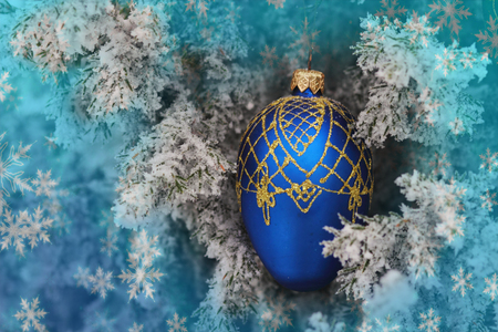 Winter background.Merry Christmas and happy New Year greeting card with copy-space.Christmas tree with decorationsの写真素材