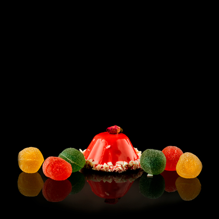 Multicolored, marmalade sweets on black backgroundの写真素材