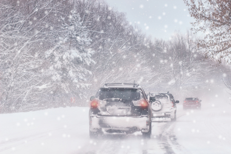 Driving in snow storm on British Roadの写真素材