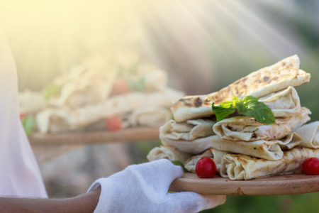lavash or pita bread. two falafel on the wooden plate. Arabian dish fried balls of chickpeas or hummus. spicy dish. Healthy diet.の写真素材