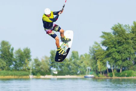 Cherkassy, Ukraine - July 19, 2019: Wakeboarder showing of tricks and skills at wakeboarding event in Cherkassyのeditorial素材