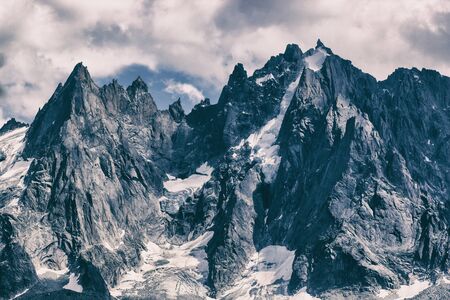 Paragliding at snow mountains over ski resort. Rock Mountains in winter. Chamonixの写真素材