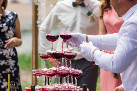 Pyramid of pink champagne. Bright emotions of your holiday. Studio Barの写真素材