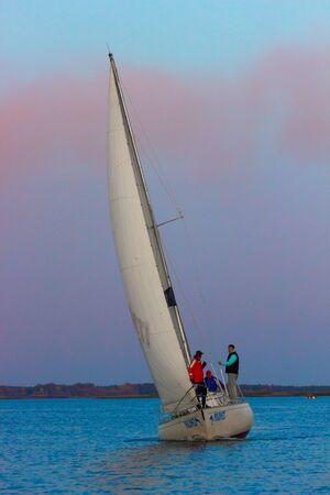 UKRAINKA, UKRAINE - OCTOBER 12, 2019: Racing sailing boats during a regatta South worth near Kiev on October 12, 2019のeditorial素材