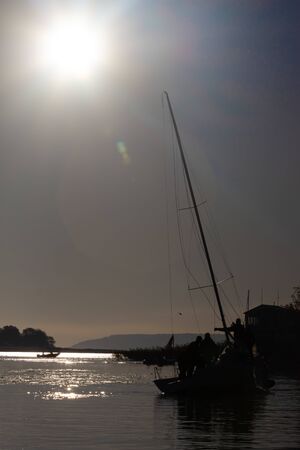 UKRAINKA, UKRAINE - OCTOBER 12, 2019: Racing sailing boats during a regatta "South worth" near Kiev on October 12, 2019のeditorial素材