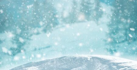 Art falling snow on the blue winter background