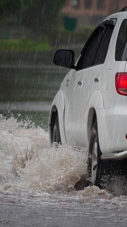 Car caught in flash flood waters from the Perkiomen Creek, Pennsylvaniaの写真素材