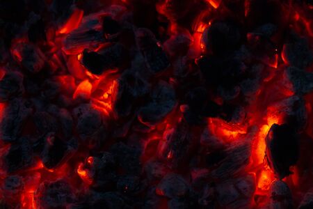 background from a fire, conflagrant firewoods and coals. redの写真素材