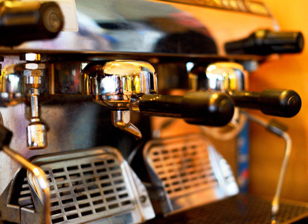 a coffee maker in a coffee houseの写真素材