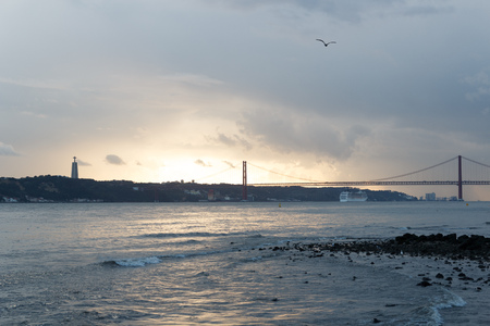 Sundown at 25 de Abril Bridge with Christ the King Statue