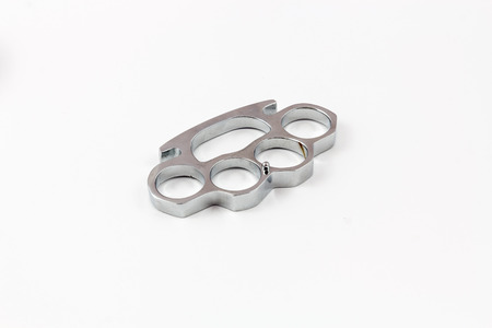 Brass knuckles weapon with white backgroundの写真素材
