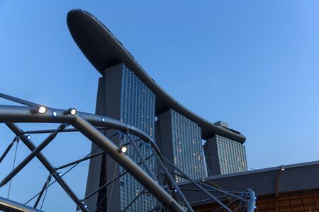 Helix bridge at hotel Marina Bay Sands in Singapore in the eveningのeditorial素材
