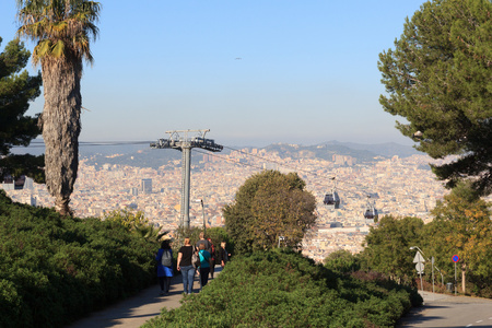 Aerial gondola lift with cable car and Barcelona cityscape panorama seen from Montjuic, Spainの写真素材