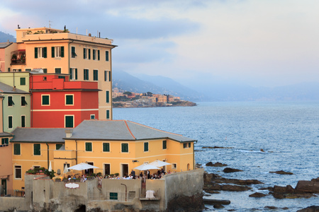 Restaurant right beside Mediterranean Sea in Boccadasse, Genoa, Italyの写真素材
