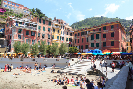 Crowded Cinque Terre village Vernazza with beautiful colorful houses, Italyのeditorial素材