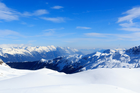 Mountain panorama with snow and blue sky in winter in Stubai Alps, Austria