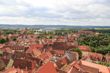 Cityscape of medieval old town Rothenburg ob der Tauber with towers, Germanyの写真素材