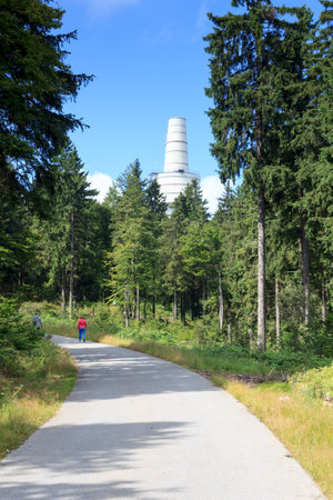 Street and former surveillance tower of NATO listening post Communication Sector F on mountain Hoher Bogen in Bavarian Forest, Germanyのeditorial素材